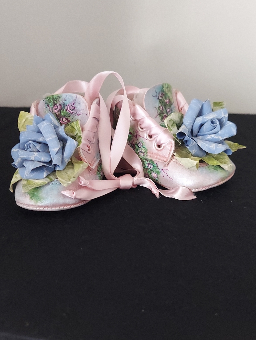 Hand-Painted Pink Decorative Baby Shoes with Blue Rose Embellishments